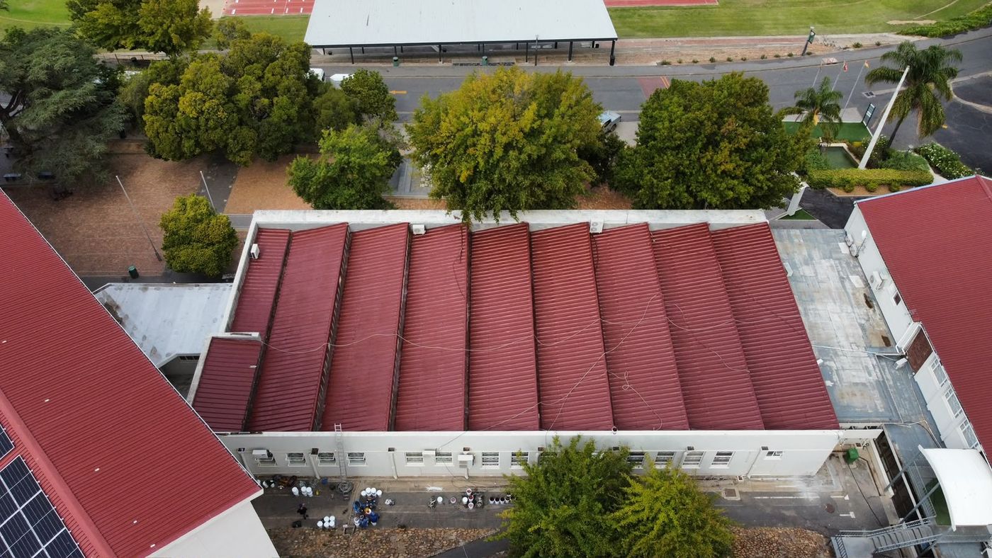School hall roof painted maroon